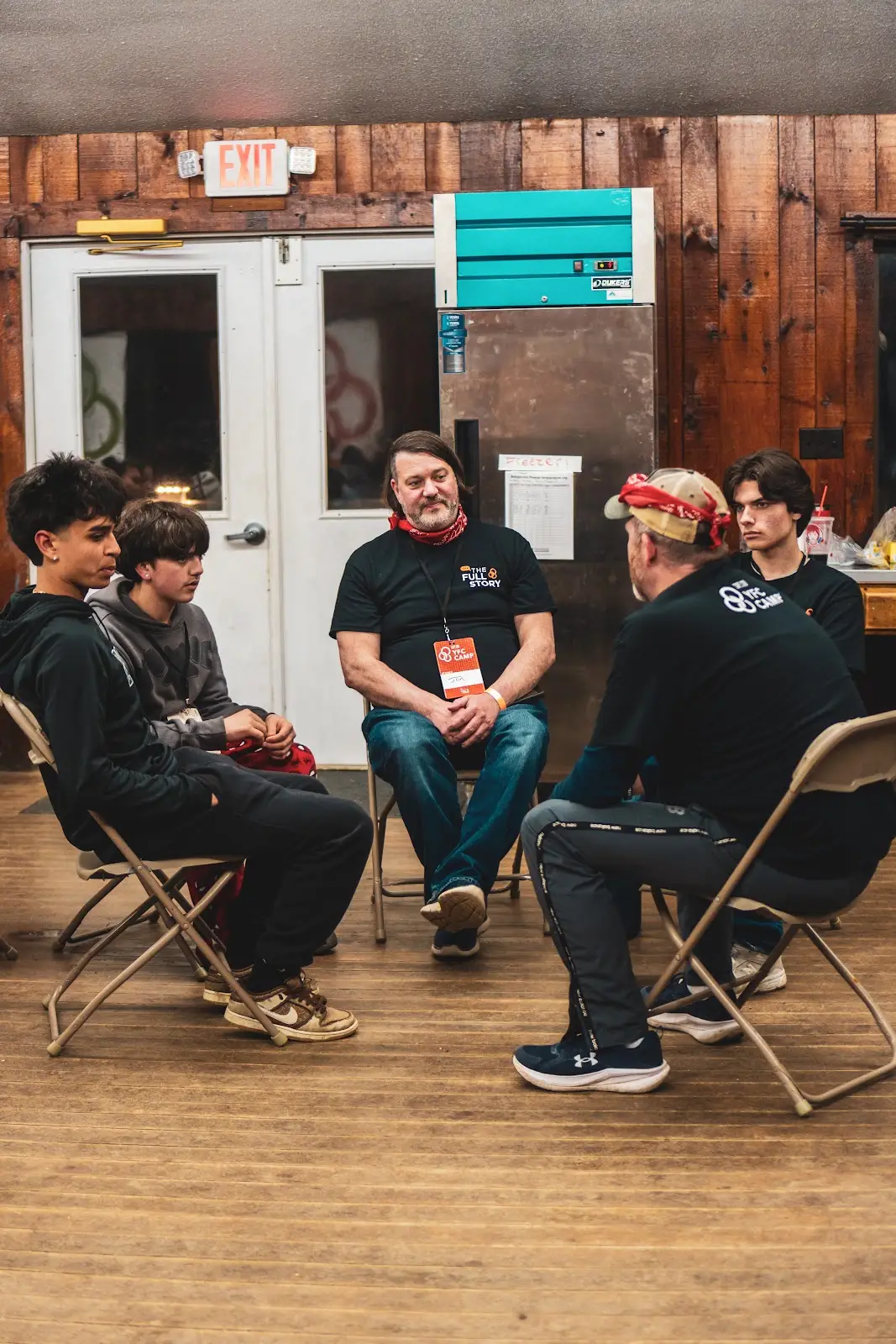 YFC Cape Cod leaders and students sitting together for a small-group conversation