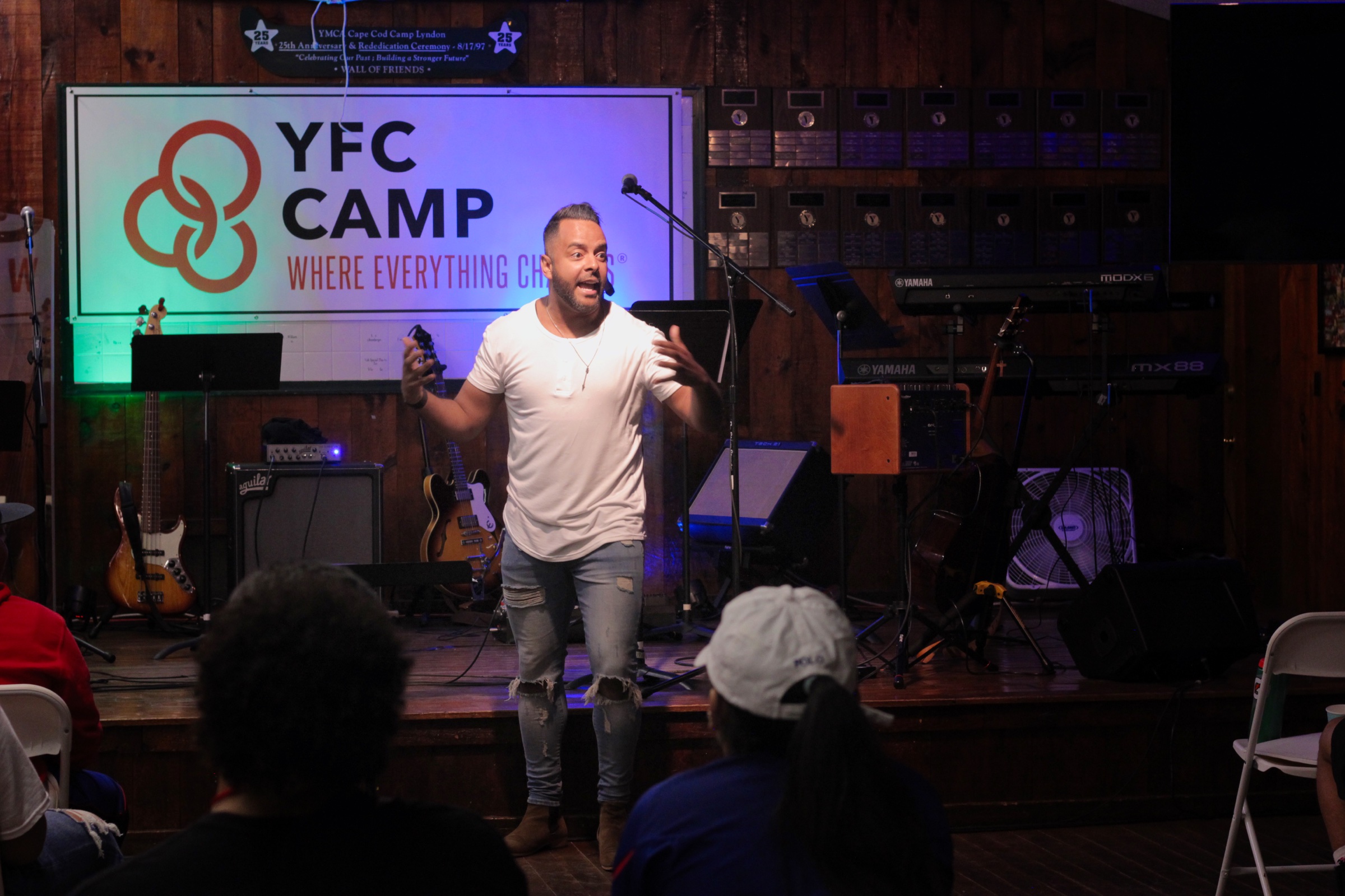 A YFC Cape Cod leader speaking to students during an evening gathering